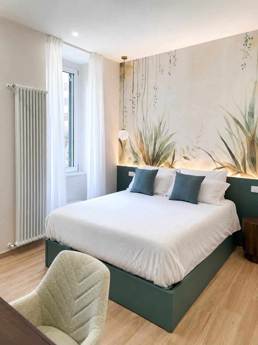 Camera da letto dell'appartamento Giada con accenti verdi